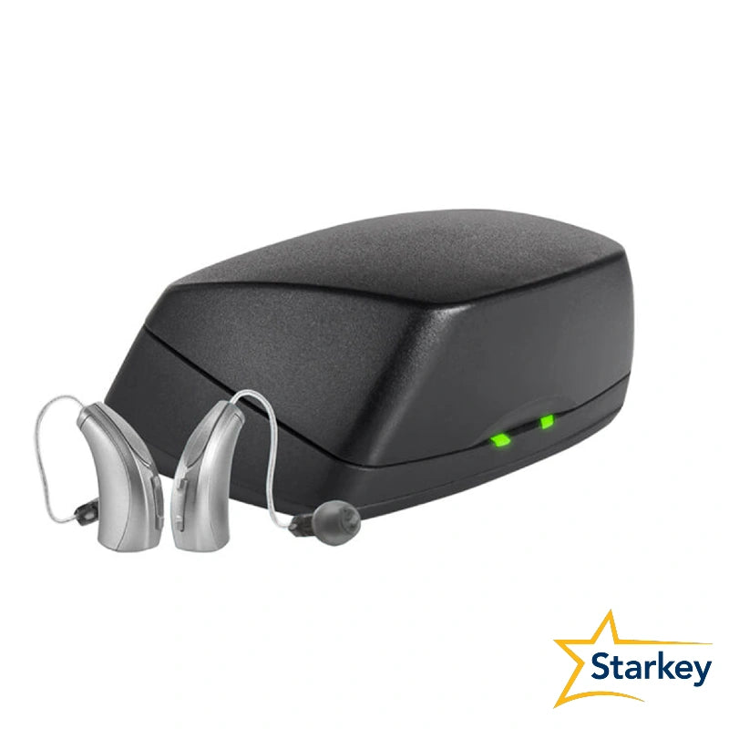 Chargeur Starkey noir fermé, accompagné de deux aides auditives